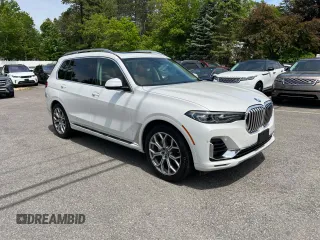 2020 BMW X7 xDrive40i z VIN 5UXCW2C0XL9B92841, wystawiony jako Copart lot #58982025 z przebiegiem 127 416 mil mil oraz Czysty tytuł • Clean title. Historia ofert i sprzedaży dostępna na DreamBid. Obrazek 1.