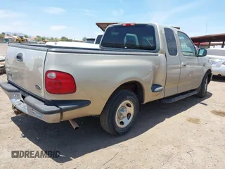2000 Ford F-150 XL with VIN 1FTRX07W6YKB19703, listed as a IAAI auction lot 42375355 with Not provided miles and . Bid and sale history available at DreamBid. Image 4.