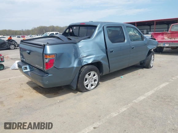 2006 Honda Ridgeline RTL with VIN 2HJYK16536H514530, listed as a IAAI auction lot 42060110 with Not Provided miles and . Bid and sale history available at DreamBid. Image 4.