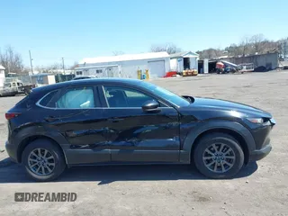 2021 Mazda CX-30 S with VIN 3MVDMBAL3MM214735, listed as a IAAI auction lot 42000096 with 46,794 mi miles and . Bid and sale history available at DreamBid. Image 13.