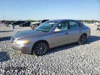 2007 Hyundai Azera SE z VIN KMHFC46F87A164195, wystawiony jako Copart lot #52500115 z przebiegiem 191 835 mil mil oraz Szkody całkowita. Historia ofert i sprzedaży dostępna na DreamBid. Obrazek 1.