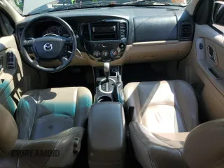 2005 Mazda Tribute i with VIN 4F2YZ92Z55KM53695, listed as a Copart auction lot 61494224 with 144,911 mi miles and Salvage Title. Bid and sale history available at carsss.com. Image 8.
