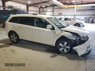 2011 Dodge Journey Mainstreet with VIN 3D4PH1FG7BT520917, listed as a Copart auction lot 54100155 with 163,423 mi miles and Salvage title. Bid and sale history available at DreamBid. Image 4.