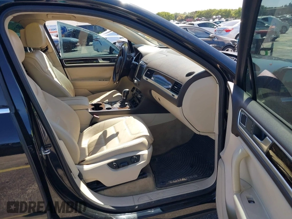 2013 Volkswagen Touareg Lux with VIN WVGEF9BP6DD004454, listed as a IAAI auction lot 41862958 with 239,548 mi miles and . Bid and sale history available at DreamBid. Image 5.