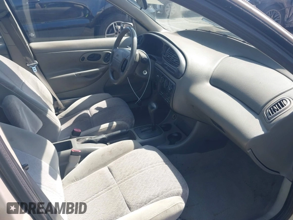 1999 Ford Contour z VIN 3FAFP66L6XM102099, wystawiony jako IAAI lot #42161889 z przebiegiem 100 340 mil mil oraz . Historia ofert i sprzedaży dostępna na DreamBid. Obrazek 5.