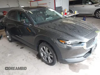 2023 Mazda CX-30 S Select with VIN 3MVDMBBM6PM575551, listed as a IAAI auction lot 42278516 with 20,794 mi miles and . Bid and sale history available at DreamBid. Image 1.
