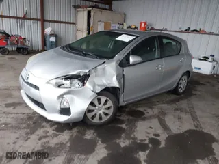 2012 Toyota Prius c One with VIN JTDKDTB34C1005531, listed as a IAAI auction lot 41529024 with 195,916 mi miles. Bid and sale history available at carsss.com. Image 2.