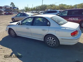 2004 Hyundai Sonata GLS with VIN KMHWF35H34A971076, listed as a IAAI auction lot 41817272 with 125,278 mi miles. Bid and sale history available at carsss.com. Image 14.