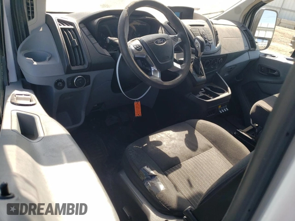 2019 Ford Transit with VIN 1FTYE1YM4KKB77840, listed as a Copart auction lot 70328604 with 264,882 mi miles and Salvage title. Bid and sale history available at DreamBid. Image 8.