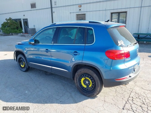 2017 Volkswagen Tiguan Wolfsburg Edition with VIN WVGRV7AX0HW502041, listed as a IAAI auction lot 31232130 with 30,214 mi miles. Bid and sale history available at carsss.com. Image 3.