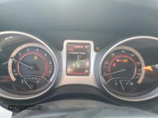 2014 Dodge Journey American Value with VIN 3C4PDCABXET277897, listed as a Copart auction lot 60566735 with 113,343 mi miles and Salvage title. Bid and sale history available at DreamBid. Image 9.