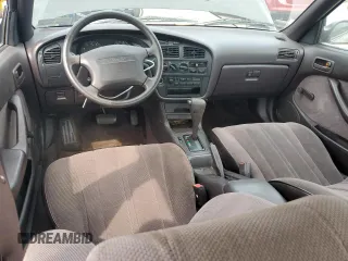 1992 Toyota Camry с VIN 4T1SK11E8NU009222, выставлен на аукционе Copart как лот 60811625 с пробегом 143 925 миль миль и Чистый • Clean title. История ставок и продаж доступна на DreamBid. Изображение 8.