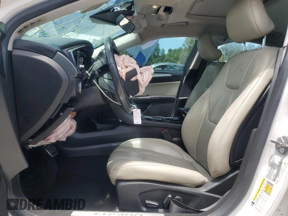 2016 Ford Fusion Titanium with VIN 3FA6P0K93GR140514, listed as a Copart auction lot 63153755 with 109,072 mi miles and Salvage title. Bid and sale history available at DreamBid. Image 7.
