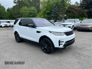 2018 Land Rover Discovery HSE z VIN SALRR2RV5JA065910, wystawiony jako Copart lot #61864105 z przebiegiem 138 066 mil mil oraz Czysty tytuł • Clean title. Historia ofert i sprzedaży dostępna na DreamBid. Obrazek 1.