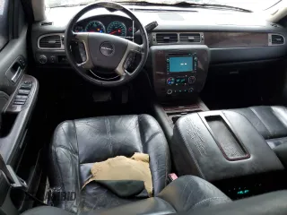 2009 GMC Yukon Denali z VIN 1GKFK03229J124008, wystawiony jako Copart lot #56189155 z przebiegiem 258 994 mil mil oraz Tytuł czysty. Historia ofert i sprzedaży dostępna na DreamBid. Obrazek 8.