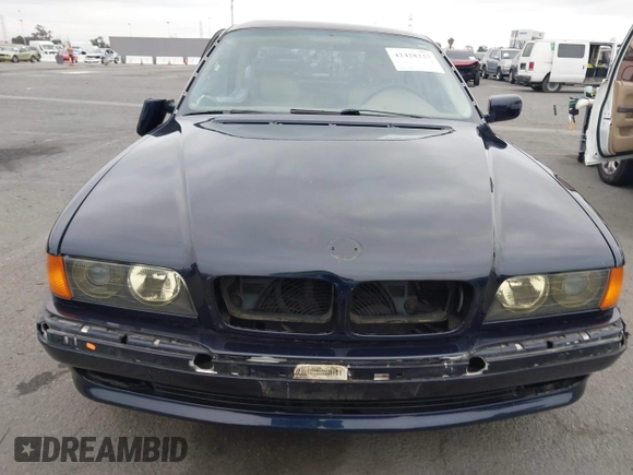 1998 BMW 7 Series with VIN WBAGF8323WDL57406, listed as a IAAI auction lot 42428227 with 93,448 mi miles and . Bid and sale history available at DreamBid. Image 11.