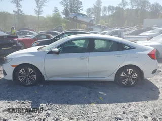 2018 Honda Civic EX-L z VIN 19XFC1F70JE000634, wystawiony jako IAAI lot #42020912 z przebiegiem 156 030 mil mil oraz . Historia ofert i sprzedaży dostępna na DreamBid. Obrazek 14.