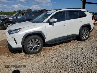 2021 Toyota RAV4 XLE Premium with VIN 2T3C1RFV0MW134008, listed as a Copart auction lot 62676445 with 61,115 mi miles and Salvage title. Bid and sale history available at DreamBid. Image 1.