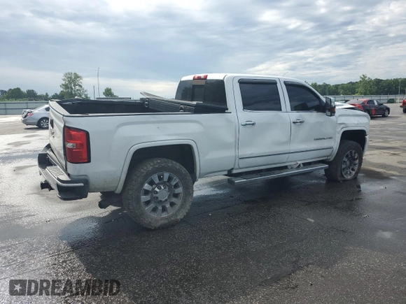 2017 GMC Sierra 2500HD Denali z VIN 1GT12UEY0HF216704, wystawiony jako Copart lot #56409765 z przebiegiem 111 525 mil mil oraz Szkoda całkowita • Salvage title. Historia ofert i sprzedaży dostępna na DreamBid. Obrazek 3.