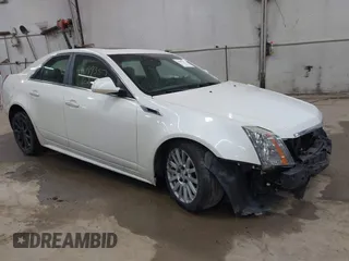 2012 Cadillac CTS Sedan Luxury with VIN 1G6DG5E55C0143029, listed as a IAAI auction lot 42099357 with 90,141 mi miles. Bid and sale history available at carsss.com. Image 1.