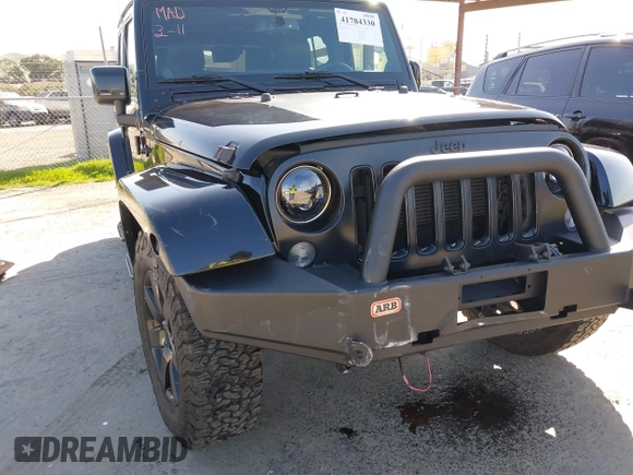 2014 Jeep Wrangler Unlimited Sahara with VIN 1C4BJWEG0EL306202, listed as a IAAI auction lot 41784330 with 79,123 mi miles. Bid and sale history available at carsss.com. Image 6.