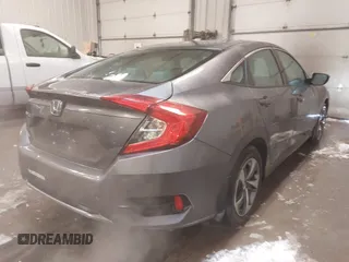 2020 Honda Civic LX z VIN 19XFC2F65LE030888, wystawiony jako IAAI lot #41609630 z przebiegiem 115 614 mil mil oraz . Historia ofert i sprzedaży dostępna na DreamBid. Obrazek 4.