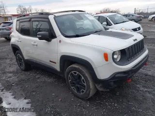 2015 Jeep Renegade Trailhawk with VIN ZACCJBCT5FPB91056, listed as a IAAI auction lot 41609659 with NaN miles. Bid and sale history available at carsss.com. Image 1.
