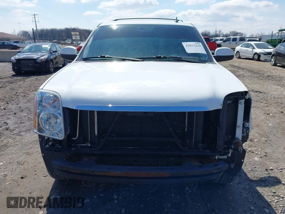 2009 GMC Yukon SLT w/4SA with VIN 1GKFK33059R282974, listed as a IAAI auction lot 42013219 with 209,240 mi miles. Bid and sale history available at carsss.com. Image 6.