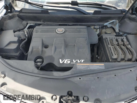 2014 Cadillac SRX Premium Collection z VIN 3GYFNGE30ES627895, wystawiony jako Copart lot #58605985 z przebiegiem 49 300 mil mil oraz Szkoda całkowita • Salvage title. Historia ofert i sprzedaży dostępna na DreamBid. Obrazek 12.