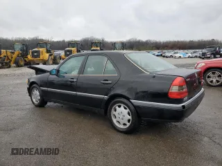 1996 Mercedes-Benz C with VIN WDBHA28E7TF328169, listed as a Copart auction lot 83653124 with 282,232 mi miles and Salvage Title. Bid and sale history available at carsss.com. Image 2.