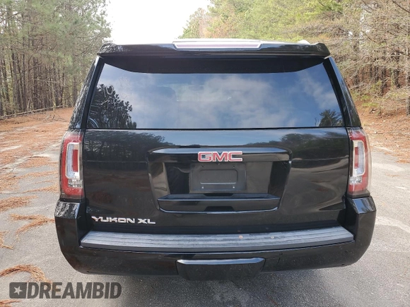 2017 GMC Yukon XL SLE with VIN 1GKS1FKC9HR221883, listed as a Copart auction lot 81000144 with 93,494 mi miles and Clean Title. Bid and sale history available at carsss.com. Image 6.