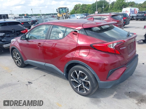2019 Toyota C-HR XLE with VIN JTNKHMBX0K1017215, listed as a IAAI auction lot 41898189 with 74,239 mi miles. Bid and sale history available at carsss.com. Image 3.