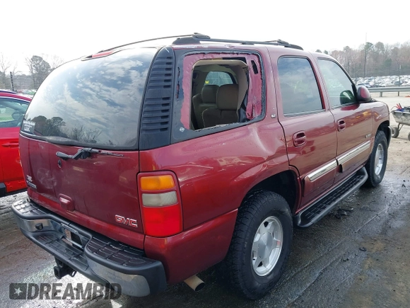 2003 GMC Yukon SLT with VIN 1GKEK13Z73R199374, listed as a IAAI auction lot 41840225 with 230,235 mi miles. Bid and sale history available at carsss.com. Image 4.