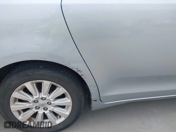2014 Toyota Sienna LE with VIN 5TDJK3DC1ES080711, listed as a IAAI auction lot 41910679 with 118,788 mi miles and . Bid and sale history available at DreamBid. Image 17.