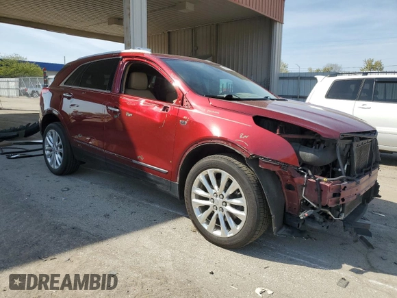 2017 Cadillac XT5 Platinum AWD z VIN 1GYKNFRS8HZ135312, wystawiony jako Copart lot #54057225 z przebiegiem 170 657 mil mil oraz Szkoda całkowita • Salvage title. Historia ofert i sprzedaży dostępna na DreamBid. Obrazek 4.