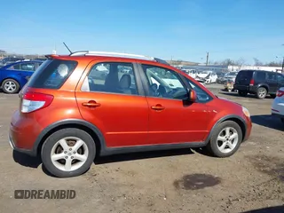 2009 Suzuki SX4 Man Touring Pkg AWD with VIN JS2YB417496201691, listed as a IAAI auction lot 41741746 with 172,369 mi miles. Bid and sale history available at carsss.com. Image 13.