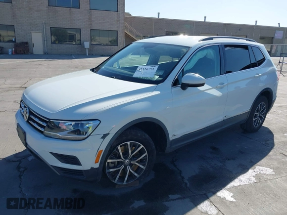 2020 Volkswagen Tiguan SE z VIN 3VV3B7AX8LM120160, wystawiony jako IAAI lot #42316791 z przebiegiem 38 702 mil mil oraz . Historia ofert i sprzedaży dostępna na DreamBid. Obrazek 17.