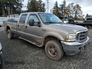2003 Ford F-350 XL with VIN 1FTSW31F13EA13259, listed as a Copart auction lot 80345954 with 209,898 mi miles and Salvage title. Bid and sale history available at DreamBid. Image 4.