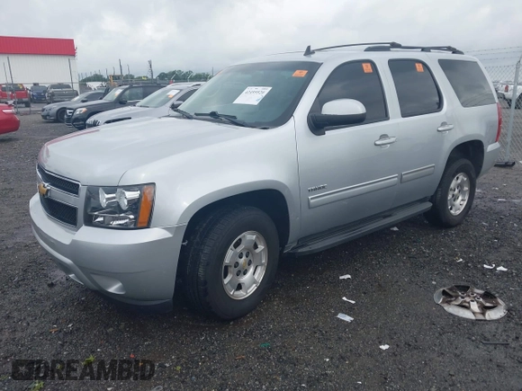 2012 Chevrolet Tahoe LS z VIN 1GNSCAE02CR308972, wystawiony jako IAAI lot #42495520 z przebiegiem 205 295 mil mil oraz . Historia ofert i sprzedaży dostępna na DreamBid. Obrazek 2.