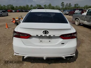 2023 Toyota Camry SE with VIN 4T1G11AKXPU767953, listed as a Copart auction lot 50728415 with 63,249 mi miles and Salvage Title. Bid and sale history available at DreamBid. Image 6.