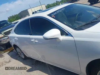 2013 Lexus ES 4dr Sdn with VIN JTHBK1GG7D2067019, listed as a IAAI auction lot 42088189 with 202,667 mi miles. Bid and sale history available at carsss.com. Image 13.