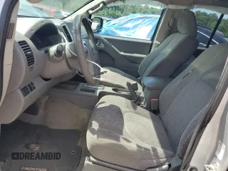 2016 Nissan Frontier S with VIN 1N6AD0ER2GN792209, listed as a Copart auction lot 60036045 with 162,516 mi miles and Salvage title. Bid and sale history available at DreamBid. Image 7.
