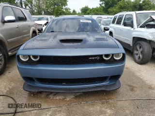 2016 Dodge Challenger z VIN 2C3CD2FJ0GH283337, wystawiony jako Copart lot #58254503 z przebiegiem 63 314 mil mil oraz Czysty tytuł • Clean title. Historia ofert i sprzedaży dostępna na DreamBid. Obrazek 5.