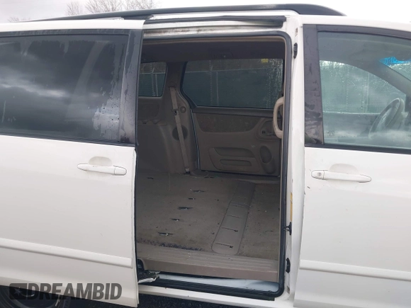 2006 Toyota Sienna LE with VIN 5TDBA23C56S057744, listed as a IAAI auction lot 41663288 with 158,299 mi miles and . Bid and sale history available at DreamBid. Image 8.