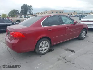 2009 Kia Optima LX with VIN KNAGE228095312766, listed as a IAAI auction lot 42074522 with 183,240 mi miles. Bid and sale history available at carsss.com. Image 4.