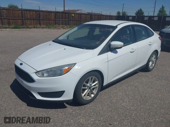 2015 Ford Focus SE z VIN 1FADP3F28FL334359, wystawiony jako IAAI lot #42520827 z przebiegiem 182 755 mil mil oraz . Historia ofert i sprzedaży dostępna na DreamBid. Obrazek 2.