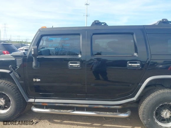 2005 Hummer H2 SUV with VIN 5GRGN23U05H128420, listed as a IAAI auction lot 41983395 with 194,925 mi miles. Bid and sale history available at carsss.com. Image 15.