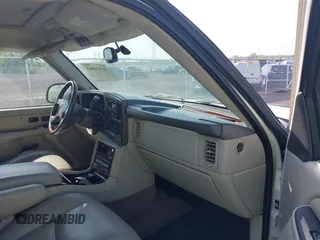 2005 Cadillac Escalade z VIN 1GYEC63T55R114823, wystawiony jako IAAI lot #41931065 z przebiegiem Nie podano mil oraz . Historia ofert i sprzedaży dostępna na DreamBid. Obrazek 5.