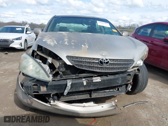 2003 Toyota Camry LE with VIN 4T1BE32KX3U123873, listed as a IAAI auction lot 42085492 with 166,901 mi miles and . Bid and sale history available at DreamBid. Image 6.