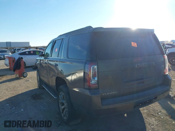 2015 GMC Yukon SLE with VIN 1GKS1AKCXFR712897, listed as a IAAI auction lot 41357889 with 1 mi miles. Bid and sale history available at carsss.com. Image 3.